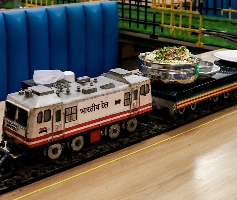 This restaurant uses model trains instead of waiters to serve food!